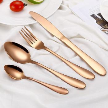 Set Navideño Arcoíris: Cubiertos Estilo Colorido para Cena
