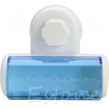 Cepillo de dientes Spinbrush con soporte de succión y estante de baño