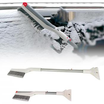 Outil de déneigement à long manche