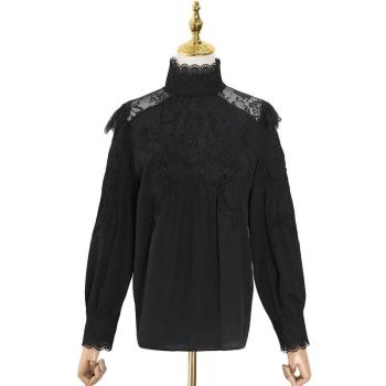 Haut ample en dentelle blanche avec manches longues