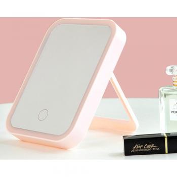 Espejo de mesa con pantalla táctil y luces para maquillaje