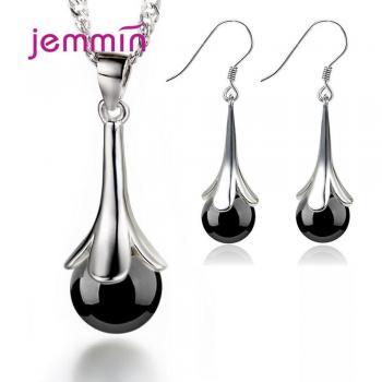 Joyería femenina: collar con colgante de hoja de la suerte y pendientes de aro en Plata de Ley 925