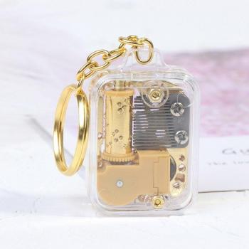 Caja de música mecánica DIY, reloj llavero dorado, 1 unidad