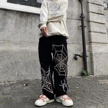 Spider Web Embroidered Ripped Denim Trousers