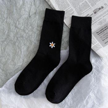Hüpfende Frauen-Socken in Schwarz und Weiß