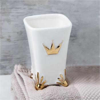 Taza de enjuague dorada para hotel