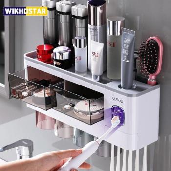 Dispensador automático de pasta de dientes y soporte de cepillos