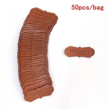 Étiquettes faites à la main en cuir synthétique 41x16mm - 50 pièces