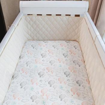 Cojín protector para cama de recién nacidos