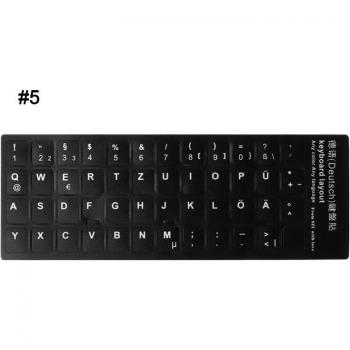 Mehrsprachiger Keyboard‑Label: Schwarzer Hintergrund, weiße Schrift – RUS, FRA, ESP, JPN, DEU, ARB, KOR, ITA