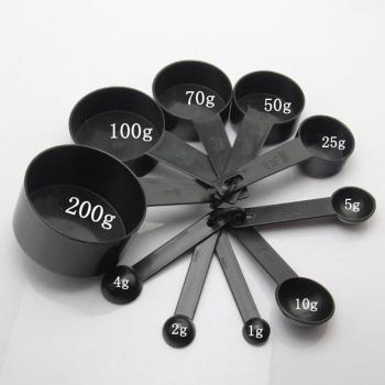 Cucharas medidoras de plástico negro para cocina
