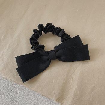 Chouchou noir à nœud papillon pour femmes