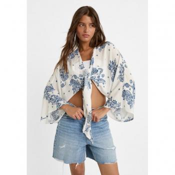Blusa fluida stampata celeste con nodo M