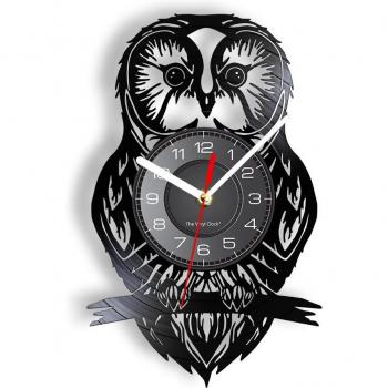 Vinilo y Vuelo Reloj